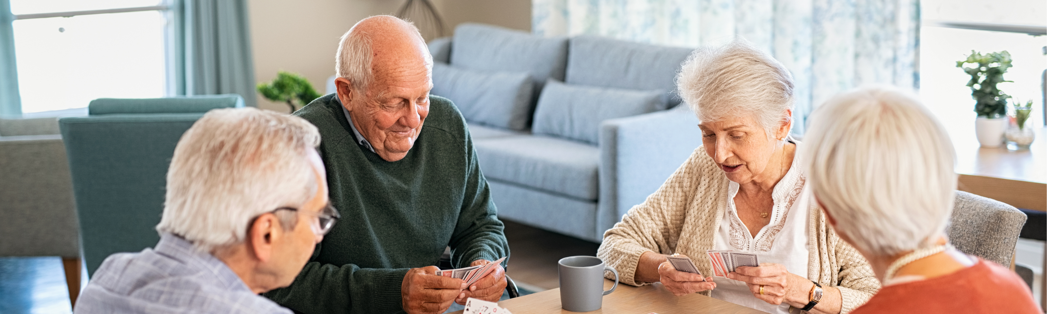 Senior care patients playing cards